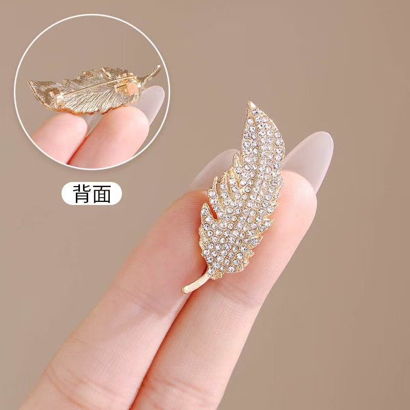 El broche de plumas de diamant - Travel Accessories Luxury reseña y precio